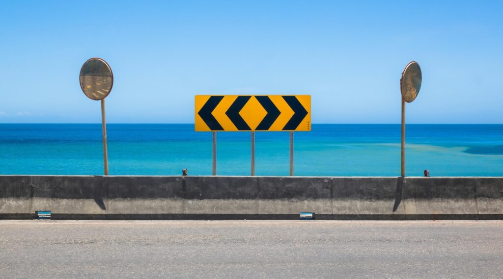 Road signs with arrows illustrating workplace health and safety tips